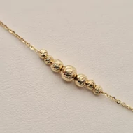 Sárga arany vésett karkötő