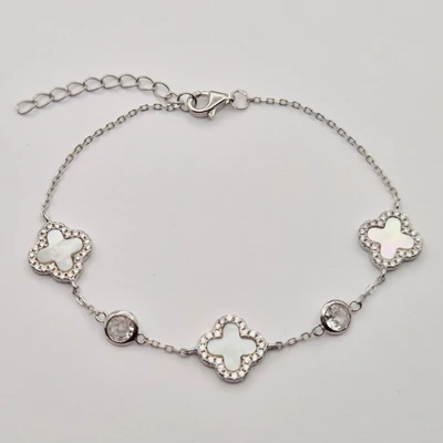 Ezüst divatos gyöngyházas  karkötő cirkónia kövekkel