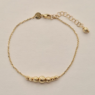 Sárga arany vésett karkötő